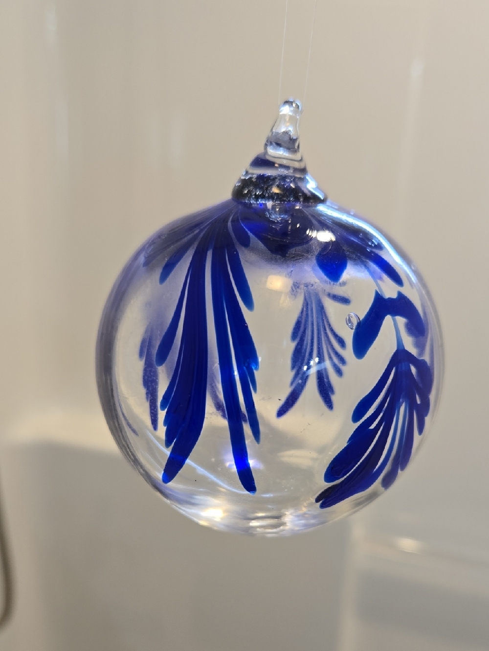 Handblown Glass Art Orb with Cobalt Blue Leaf Motif